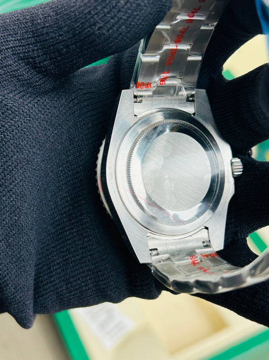 Rolex Oyster Perpetual Submariner Date with a black dial and bezel,